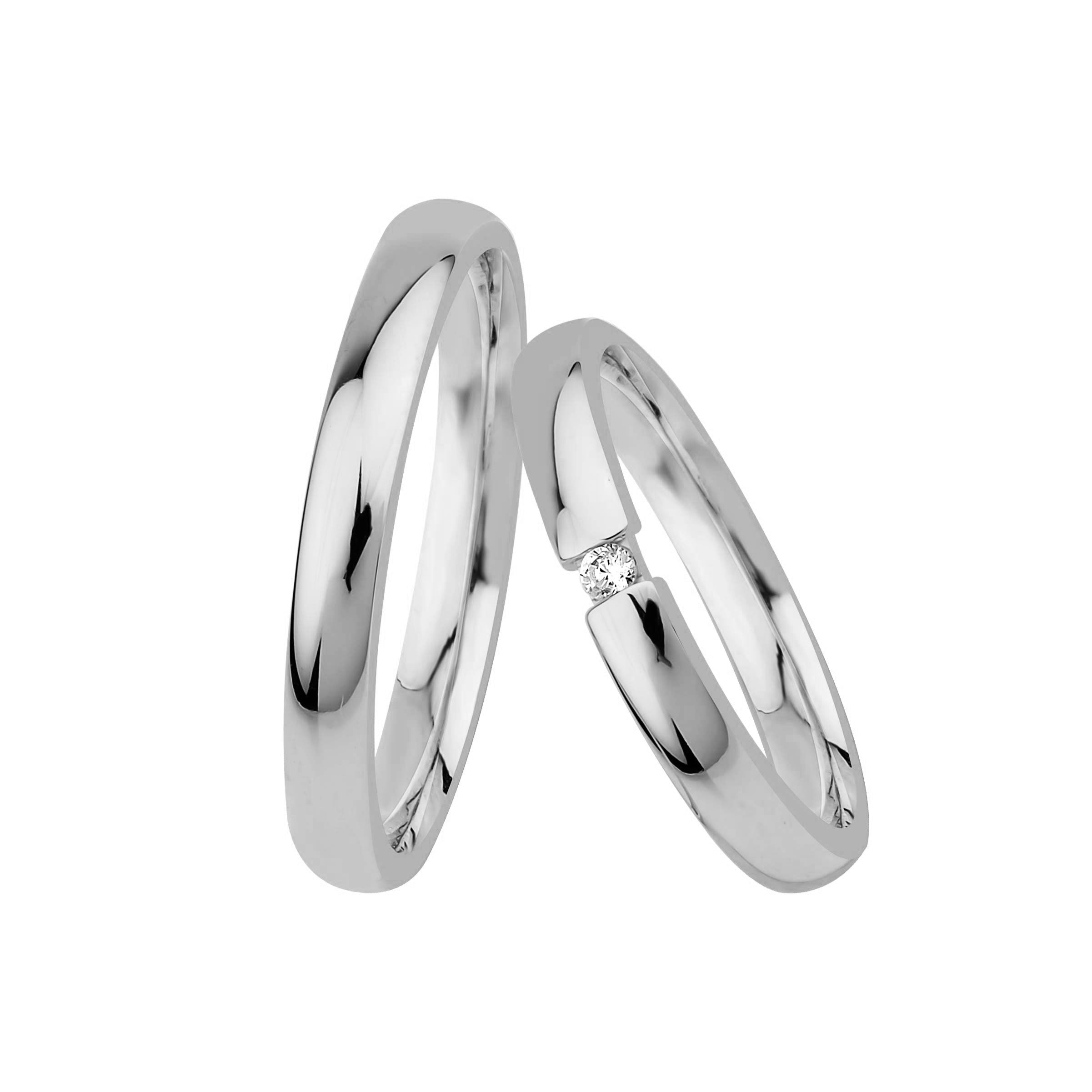 Exklusive Amalfi Eheringe aus massivem Platin mit handgefasstem Brillant, elegantes Design, handgefertigt in unserer Manufaktur